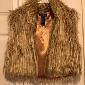 Vest xs fits like a small